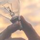 lightbulb in someones hand